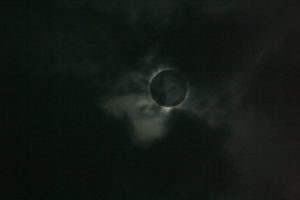 Total Solar Eclipse surfing between clouds